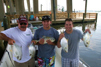 Ray Starrett and sons with some of their Florida pompano catch made aboard TEAM BRODIE CHARTERS