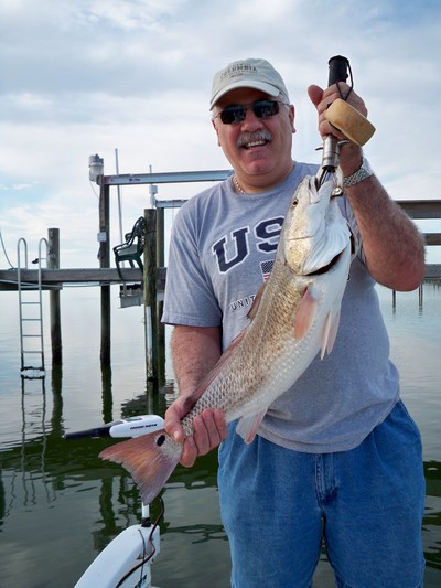 Wayne Foisy with an oversize redfish