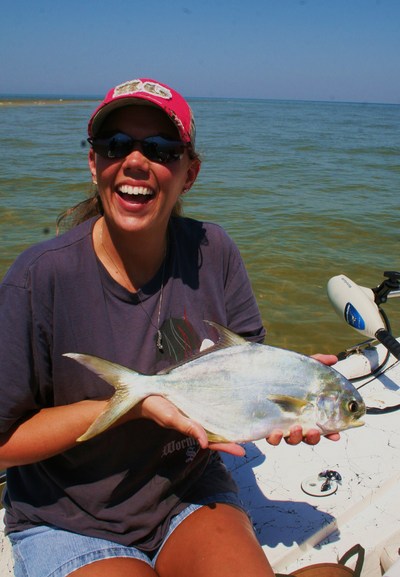 Amanda Wood of Texas is all smiles with here first Florida pompano caught aboard TEAM BRODIE CHARTERS