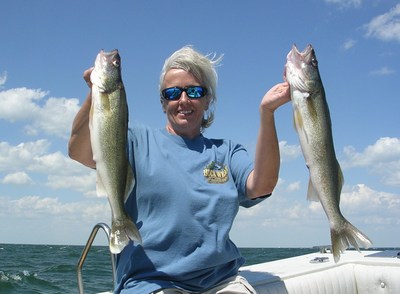 Heidi shaow a pair of plump Lake Erie walleye aboard Erie Quest Charters