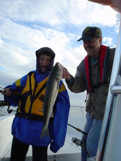 Josh & Dad with Josh's first striper