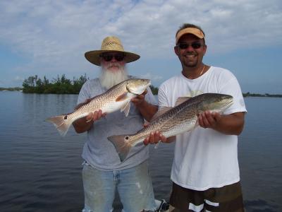Don White and Mike Mapps with a double redfish catch....