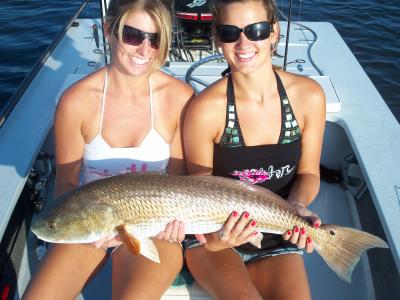 Brenna and Lynsee with a 20 pound redfish. More photos on the website.