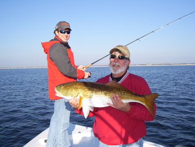 December red fishing can be great fun, this big redfish hit a spro j white buck tail jig, after a quick pic it was released.