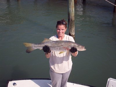Leslie Pfeiffer with one of her snook she caught in the Ft. Pierce Inlet.