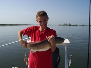 Bobby Altieri holding one of five reds he caught....