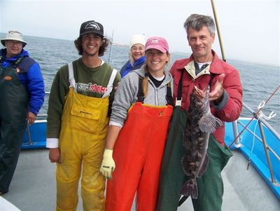 Angler and crew with lingcod