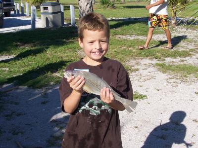 Shane Mercado with a croaker he caught on a recent Junior Teen Angler tournament.