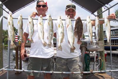 Ron & Mark Macintosh with 2 limits of Trout and a Flounder to boot