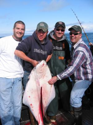 Brad Davis, Justin deckhand, Captain James and Bob Ottum with Halibut