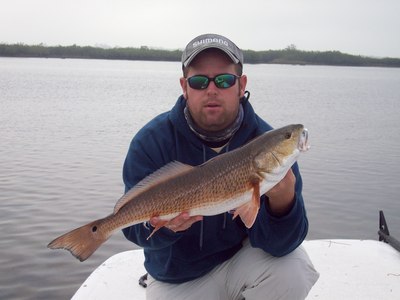 Capt Josh with a redfish