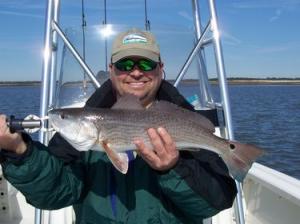Shakespeare VP Matt Fletcher with a pig red