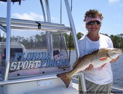 Trish shows off her Redfish.
