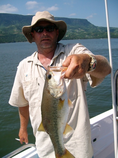 Captain Mike with a fair size Big Mouth Bass