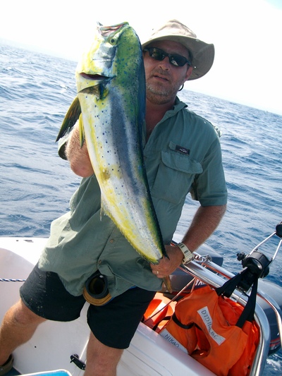 Captain Mike with one of the smaller Dorado