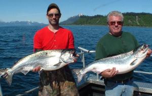 Portland Oregon Anglers Lenny Greco and Gene McLaughlin take a break from the furious salmon action to pose for a quick photo before getting back to work during a day of fishing this past May.
