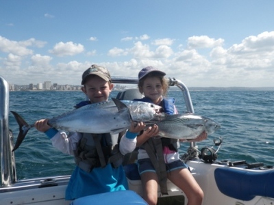 Children game fishing offshore Durban