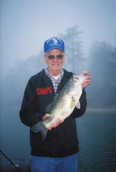 DeRidder, LA client, Jerry DuBose, shows off one of several quality bass he landed while fishing the Louisiana Island area of The Bend.