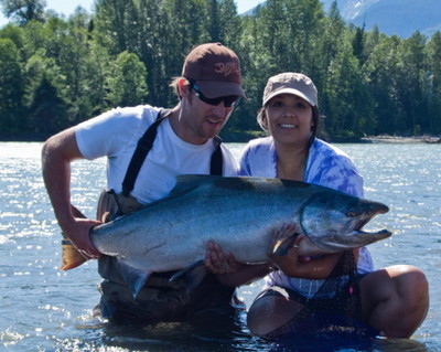 Photo of the Week - Season Review: Chad Black and Monique Brand with a huge Chinook caught and released on the Skeena River in early July 2010.  They were fishing with Redl Sports http://www.redlsports.com Fraser King 10'6 rod, Ambassadeur