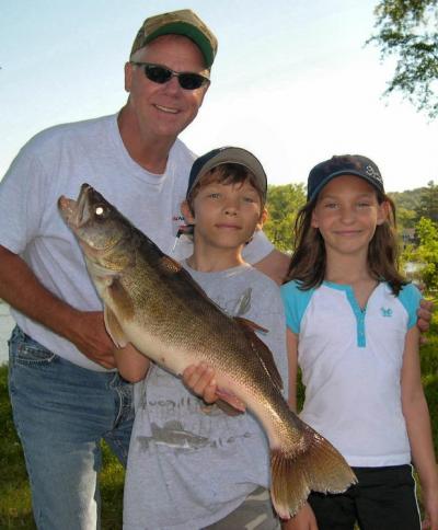 Bob Benson with grandkids Andrew & Emily Allen
