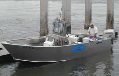 Capt Dave's 26' charter boat at the dock