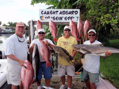 My buds and I with summertime Atlantic Red Snapper,