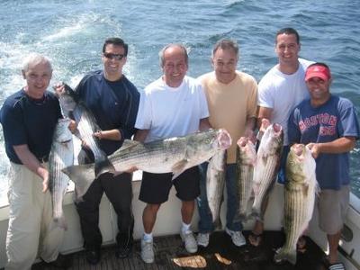   Airasian Family - 48 inch Striped Bass, Fishing Charter on Tuna Hunter http://www.tunahunter.com