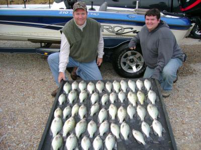 Here is a late fall trip with clients Barry and Adam Sunstrom from Milford Kansas on November 18th 2007 - we had a great day on the water with 47 good keeper crappie – with around 60 crappie total caught. All these came from Spider Rigging channel ledges