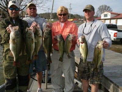 Four Happy Anglers with Over 40 Pounds of Bass, including Two 9 Pounders!