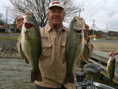 The author with a pair of hogs! A 9 & 10 pound bass!