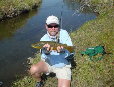 Capt. Rick Grassett, from Sarasota, FL, with a nice Mill Creek brown trout caught on a hopper fly pattern.