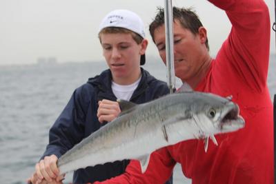 Capt Rod with a nice kingfish just caught fishing in Ft Lauderdale