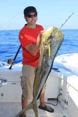 Timothy Caruso with his Dorado caught aboard the 37ft