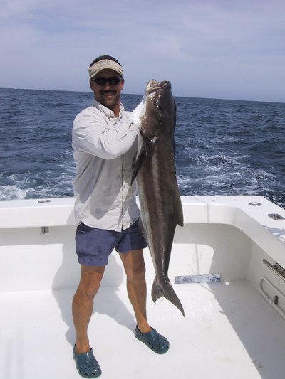 Reuben Ware showing of a 40 pound Cobia caught on 20 pound tackle!