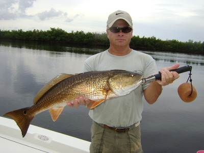 captain tony frankland with a redfish