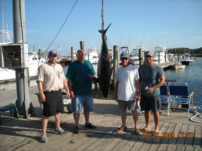 It took the crew to bring this bad boy to the dock