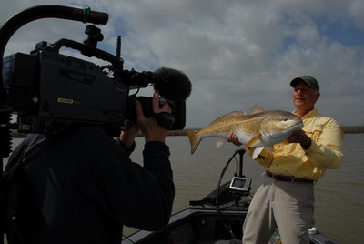 Dog and camerman display another Red