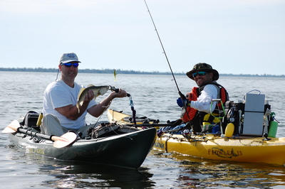 One of our Saltwater fishing clients with his first Sea Trout!