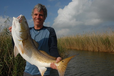 Clint Willis with an AWESOME Red caught in 1' 1/2 of water