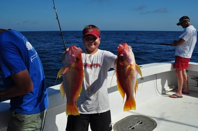 Grady Gunn showing off a pair of long tail bass