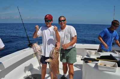 Kelley Gunn with a pair of nice yellowedge Grouper