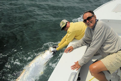 Dennis Ondercin's Sarasota tarpon caught and released with Capt. Rick Grassett.