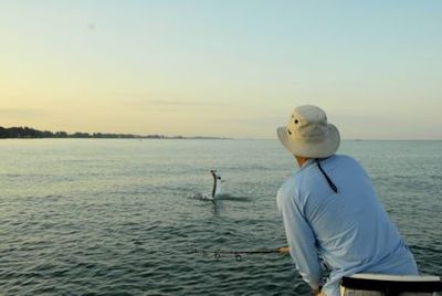 Domenick Raschella Sarasota tarpon jump with Capt. Rick Grassett
