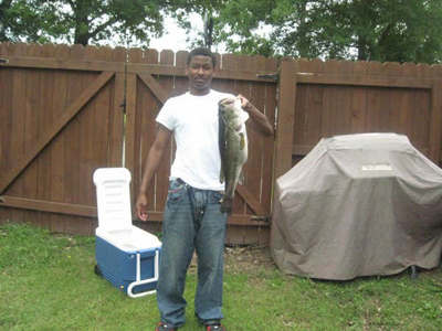 A very happy kid with a big 10 pound largemouth bass!