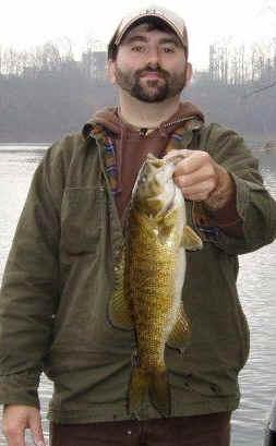 Vince Keiper holds a 20.25 inch December smallie. (Hair Jig)
