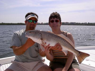 client Cindy Goodwin with a hefty 10 lb. redfish