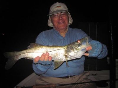 Sarasota winter resident, Gary Marple, with a snook caught and released on a Grassett Snook Minnow fly while fishing the ICW near Venice at night with Capt. Rick Grassett.