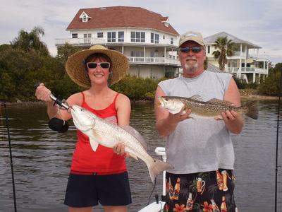 Gary & Missy with redfish and trout.