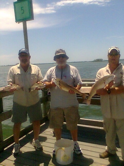 Showing off their redfish and snappers