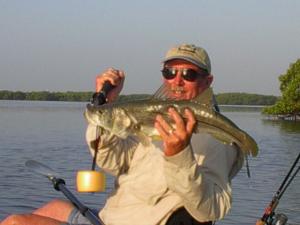 Sarasota\'s Jack Hartman shows off a Joe Bay snook just before releasing it.